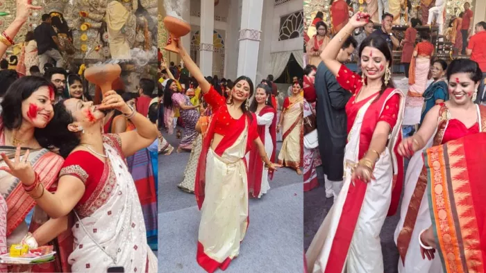 सिंदूर खेला रस्म के दौरान नृत्य करती महिला श्रद्धालु। फोटो सौ.- संजय गुलाटी