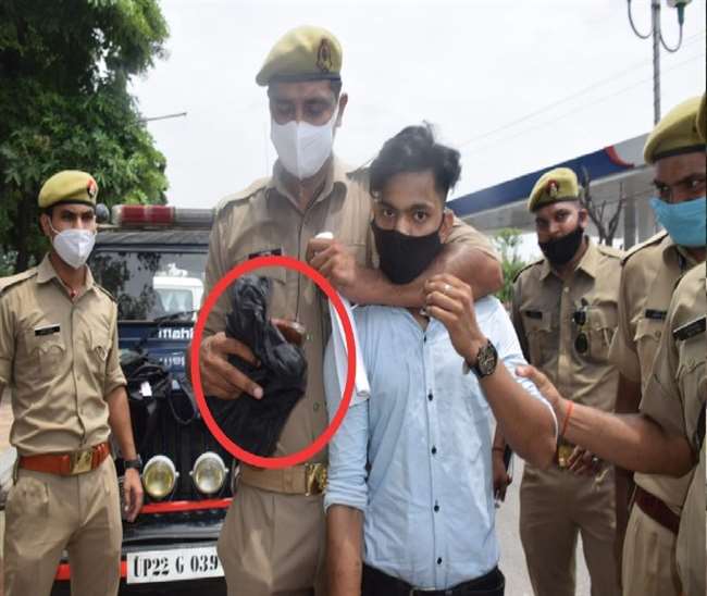 district panchayat president election controversy during voting in rampur young man caught with a weapon