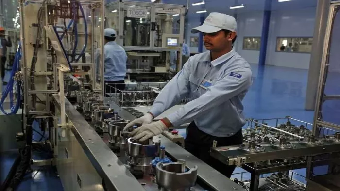 India's services sector growth climbs to 13 year high in July