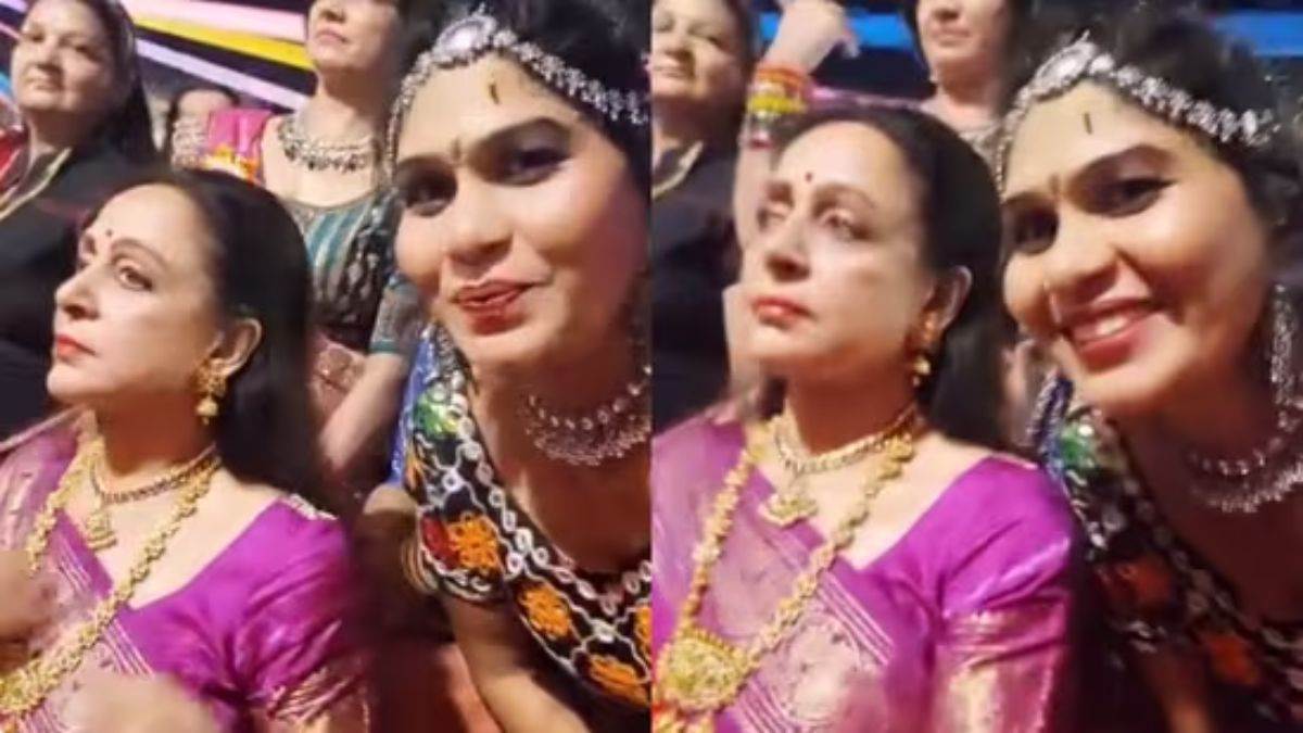 hema malini misbehaves with a fan during navratri event denies to smile for the camera