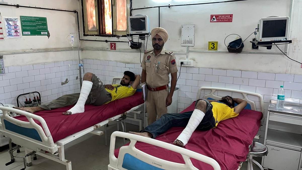 snatchers started running after seeing a checkpoint in derabassi fell on the road after their bike slipped police caught both of them