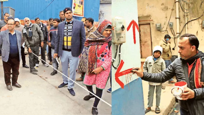 ठा. बांकेबिहारी मंदिर के प्रस्तावित गलियारा को संपत्तियों का चिन्हांकन व मूल्यांकन करने को ठीम के सदस्य नापजोख करते हुए।