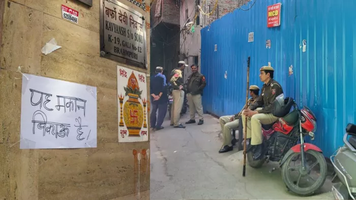 ब्रह्मपुरी गली नंबर-12 में घर के बाहर लगा मकान बिकाऊ है का पर्चा। फोटो-जागरण