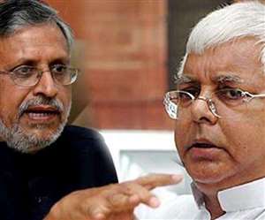 राज्यसभा सदस्य सुशील मोदी और राजद सुप्रीमो लालू यादव। जागरण आर्काइव।