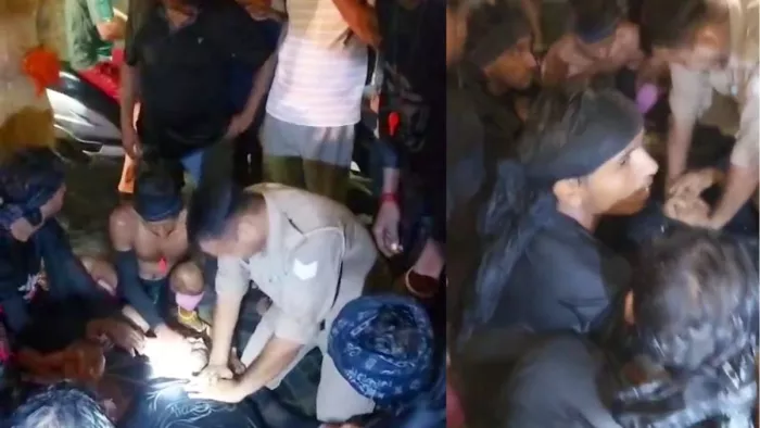 मुरादाबाद के महाराणा प्रताप सिंह चौक पर हार्ट अटैक आने पर बेहोश शिवभक्त को सीपीआर देते मुख्य आरक्षी राजेन्द्र गंगवार।सौ.पाठक