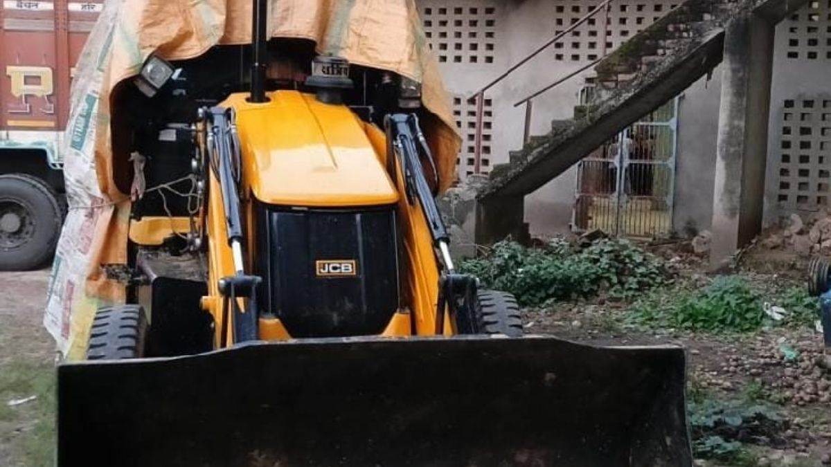 bulldozer ran over a car in up following a dispute over a love affair and youths beat them up