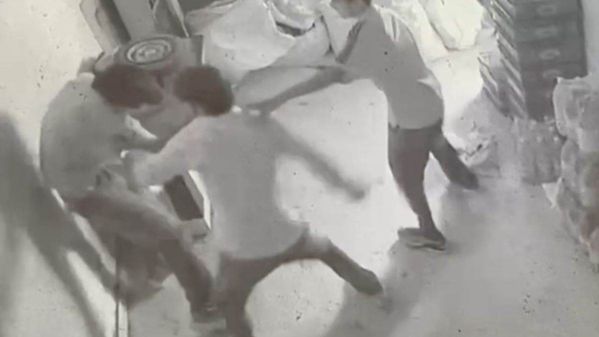 young man was stabbed to death over an old rivalry and the attack took place after he entered a shop