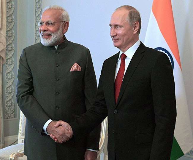 https://www.jagranimages.com/images/newimg/04122021/04_12_2021-modiputin_22265607.jpg