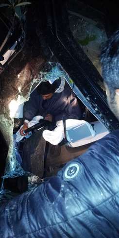 car slides from road in 300 meter deep gorge at ramban but tree branches hold it and driver is safe