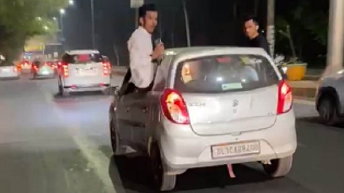 ncr ghaziabad people fireworks on mercedes and bmw roof alto riders did stunts violation traffic rules creating ruckus by car riders