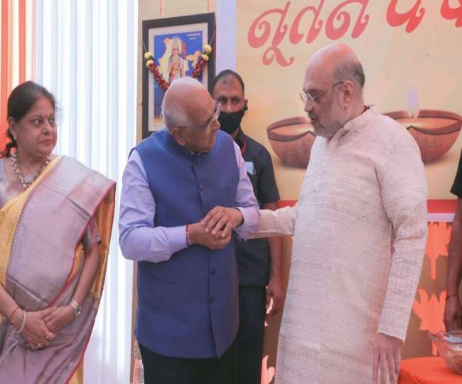 gujarat cm and state bjp leaders meet amit shah to greet him on gujarati new year