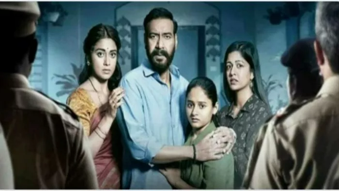 Still Image of Ajay Devgn, Shriya Saran and Ishita Dutta from Drishyam 2