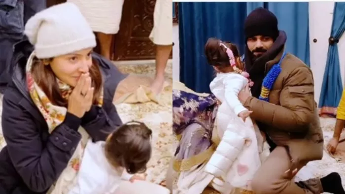Still Image of Anushka Sharma and Virat Kohli with Vamika