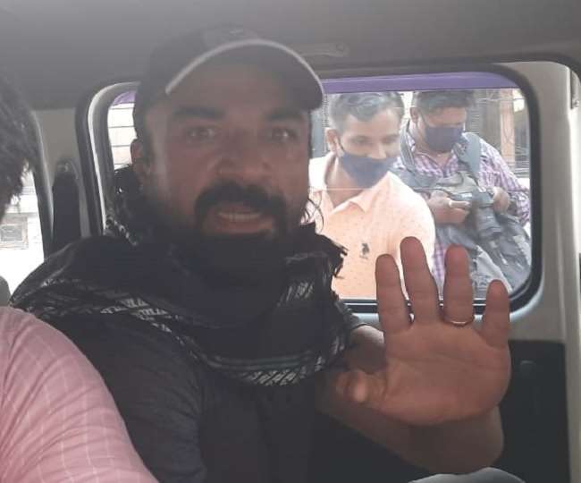 Ajaz Khan with NCB officials. File Photo- ANI