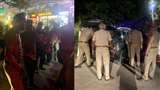 युवक को साथ लेकर जाती हुए पुलिस। (जागरण)