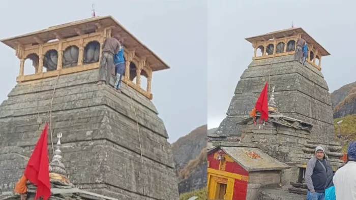 Tungnath Temple: तुंगनाथ मंदिर के शिखर पर बैठे व्यक्ति का फोटो वायरल