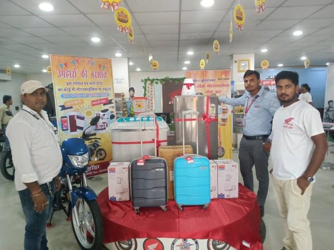 ramji honda showers of gifts suitcase free on every car