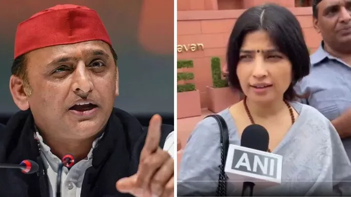सपा प्रमुख अखिलेश यादव और डिंपल यादव।