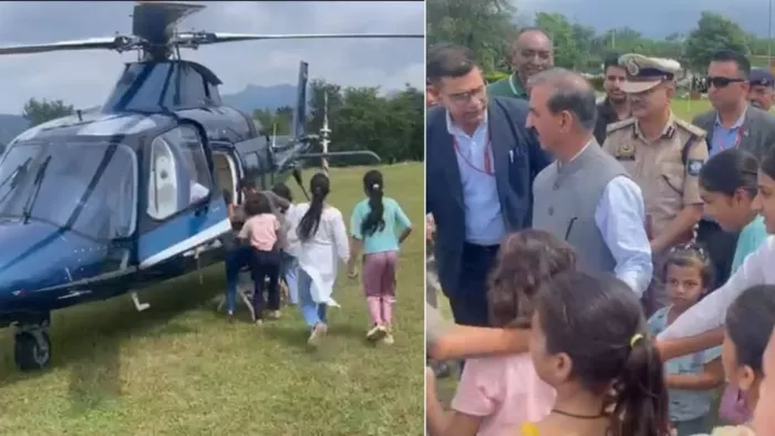 मुख्यमंत्री सुक्खू के हेलीकॉप्टर में बैठते बच्चे व सीएम अधिकारियों से बात करते हुए। जागरण