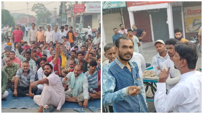 पार्किंग ठेकेदार से विवाद के बाद रेहड़ी-फड़ी वालों ने दिया धरना,