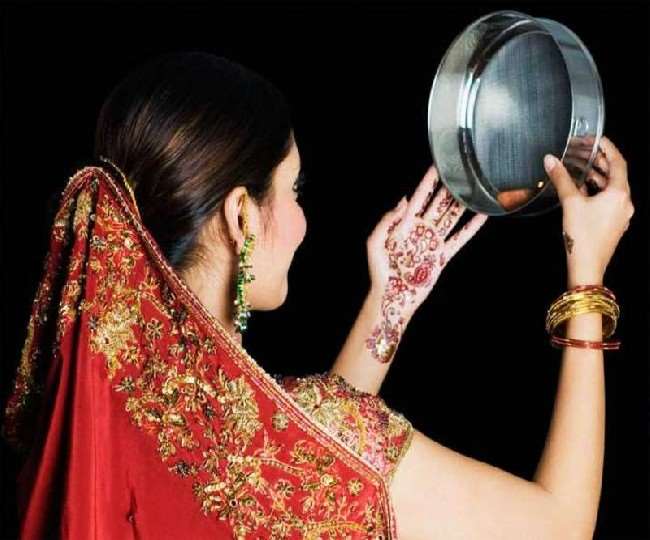 Karva Chauth 2024 Why do married women see the moon through a sieve on