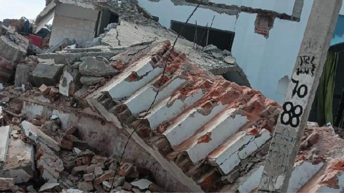 mosque committee demolishes gate and wall with bulldozer