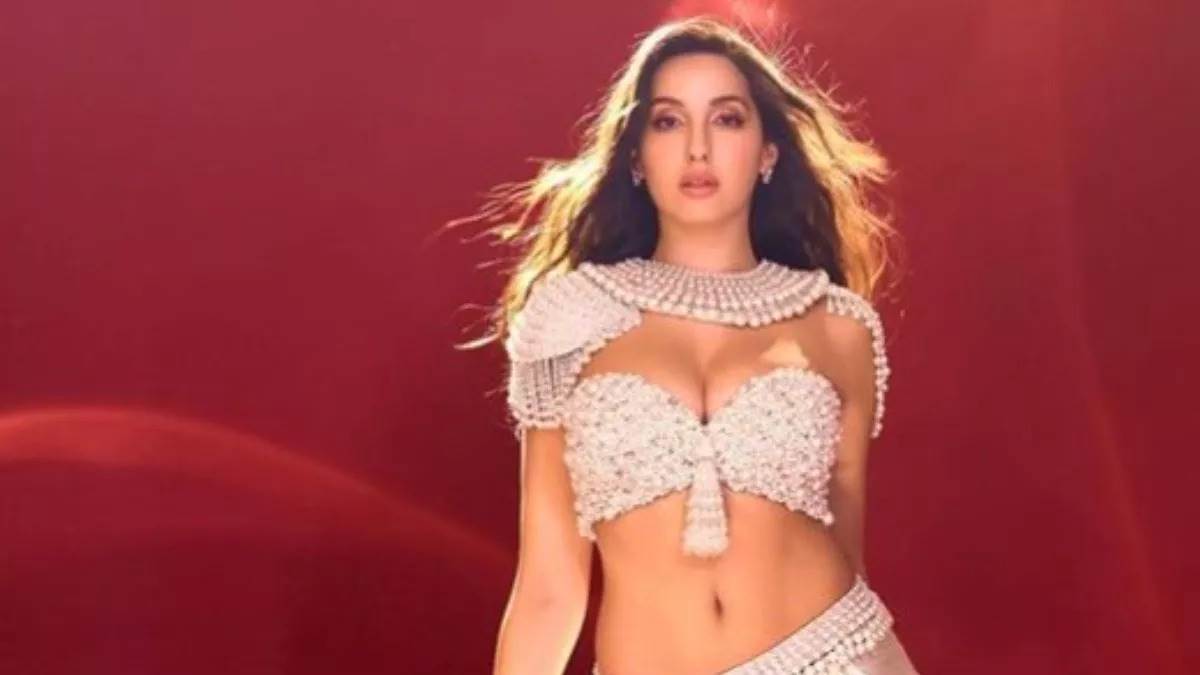 nora fatehi brutally trolled for her latest look fans comments on her white dress dramatic sleeve trolls says bath tub se utha kar a rhi ho kya