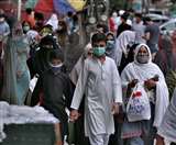 पाक में लाकडाउन से पहले बाजारों में उमड़ी भीड़