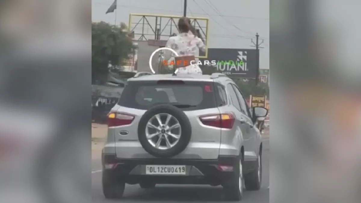 कार की रूफटॉप पर युवती का स्टंट… वीडियो हो रहा वायरल, पुलिस ने लिया एक्शन