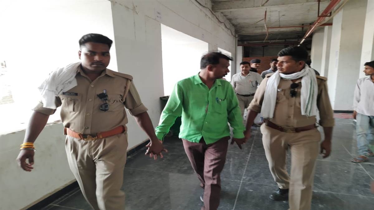 fake teacher arrested while checking copy of ug pg infake teacher arrested while checking copy of ug pg in veer bahadur singh purvanchal university nine absconding nine absconding