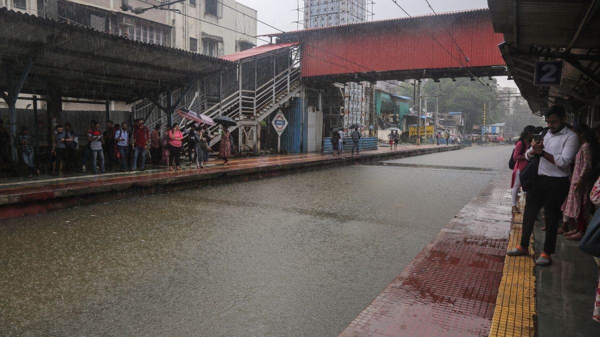heavy rains cause havoc in mumbai many areas submerged railway tracks also submerged in some places air traffic also disrupted