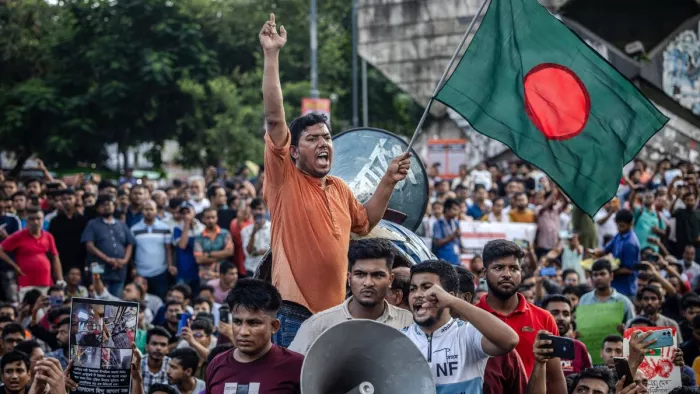 बांग्लादेश में रहने वाले हिंदुओं पर हो रहे हमलों के खिलाफ हजारों लोगों ने प्रदर्शन किया। फोटो- रायटर।
