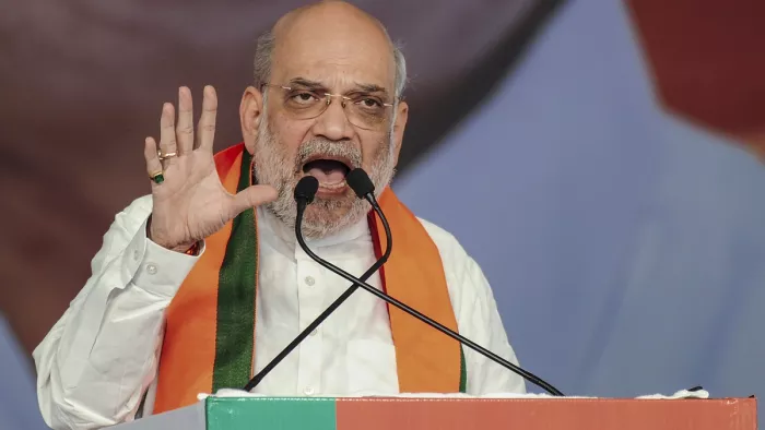 अमित शाह ने आरक्षण के मुद्दे पर कांग्रेस को घेरा। फोटो- PTI