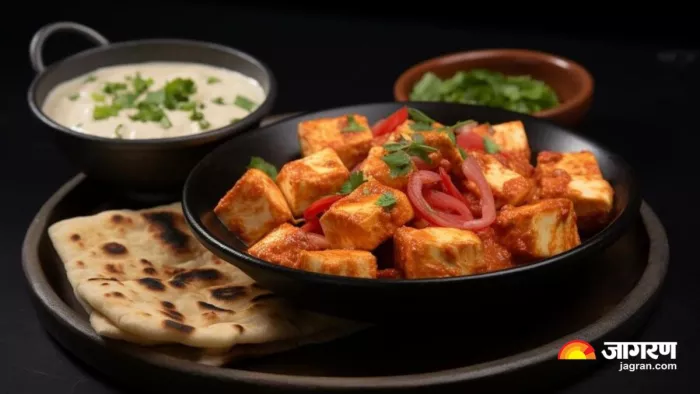इस आसान रेसिपी से बनाएं ढाबा स्टाइल Paneer Tikka Masala (Image Source: Freepik)