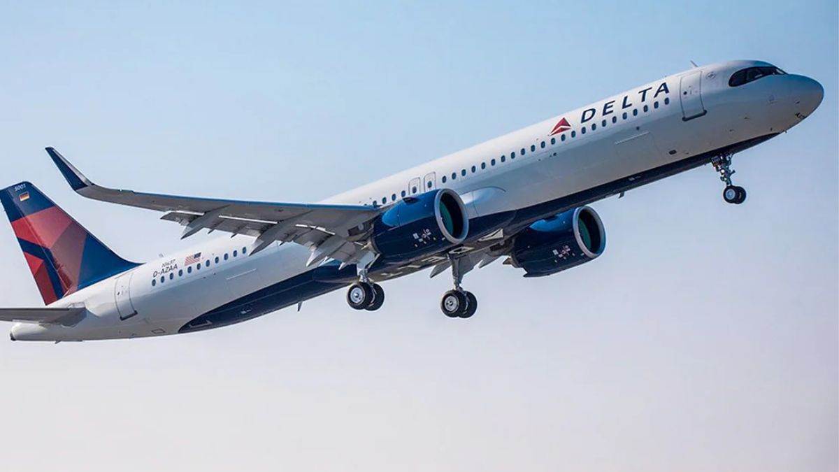 american flight emergency landing crew members injured due to air slide opening inside plane