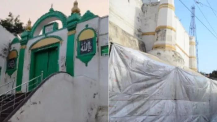 जामा मस्जिद के पिछले हिस्से को प्रशासन ने तिरपाल से ढकवाया। (तस्वीर जागरण)