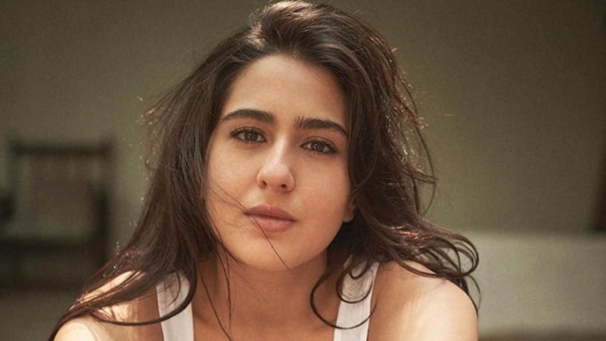 sara ali khan spotted at airport wearing stylish pink crop top and pant look video fans reaction goes viral on social media
