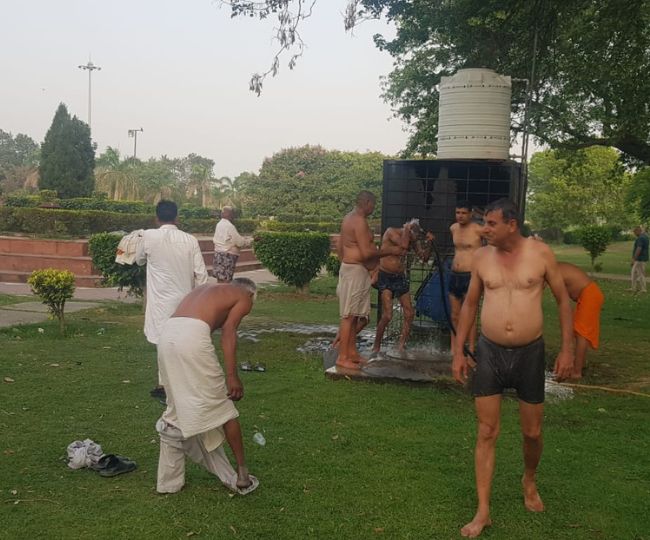 Farmers Bathing in Road and park