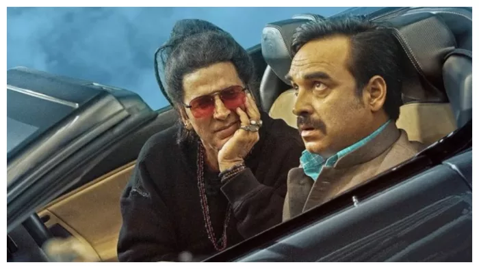 Still Image of Akshay Kumar and Pankaj Tripathi from OMG 2