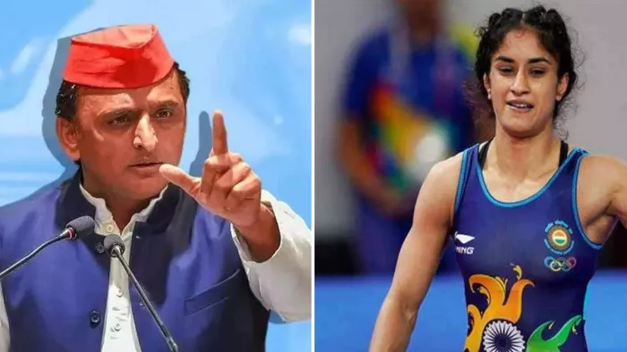 सपा अध्यक्ष अखिलेश यादव व पहलवान विनेश फोगाट। (फाइल फोटो)