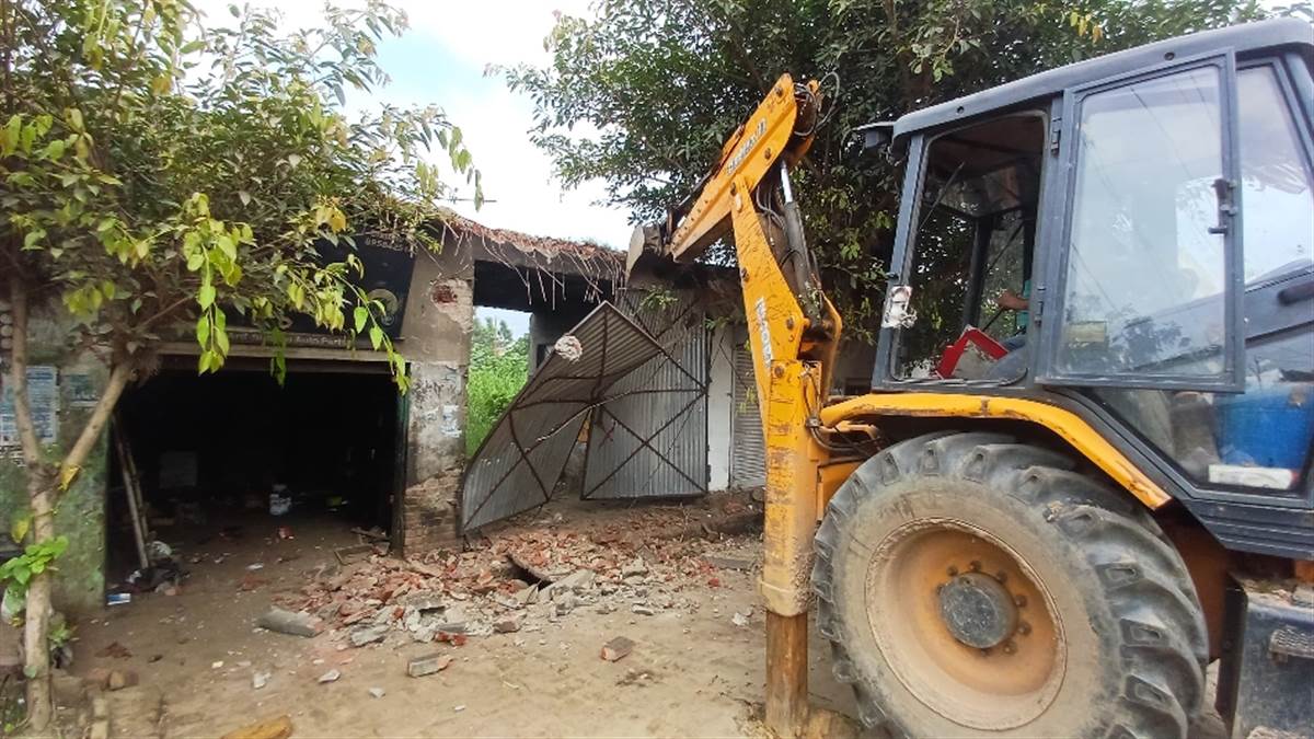 sambhal bulldozers demolish illegal shops on government land
