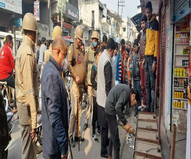 remove encroachment campaign in rampur the drains were also cleaned traders created a ruckus