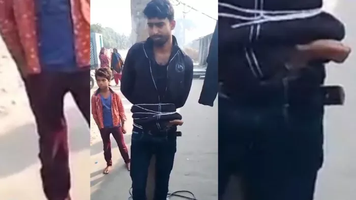 बिजली के खंभे में कट्टा लिए युवक को बांधा
