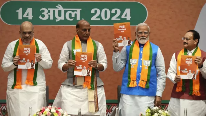 भाजपा ने जारी किया संकल्प पत्र। फोटो- एपी।