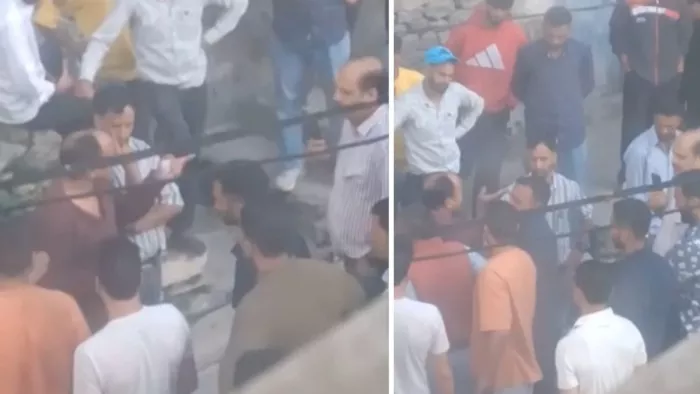 भरमौर में एडीएम कुलवीर राणा के साथ उलझता शख्स।