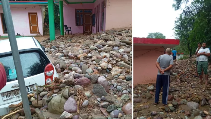 सुजानपुर के खैरी में घर में घुसा मलबा और दबी कार। जागरण
