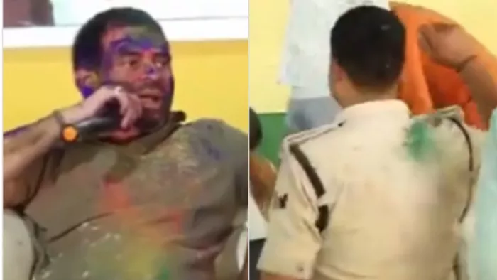 होली के एक कार्यक्रम में तेजप्रताप यादव ने पुलिस कर्मी से कराया डांस। (सौ. इंटरनेट मीडिया)
