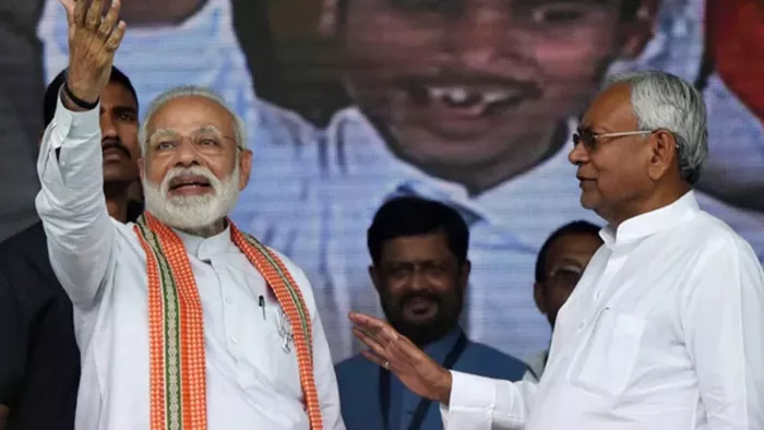 एक चुनावी रैली में प्रधानमंत्री नरेंद्र मोदी के साथ नीतीश कुमार। फाइल फोटो