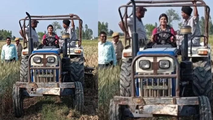 करौता गांव में ट्रैक्टर से जुताई कर चकरोड से अतिक्रमण हटातीं महिला एसडीएम दिशा श्रीवास्तव। सौ. सूचना विभाग