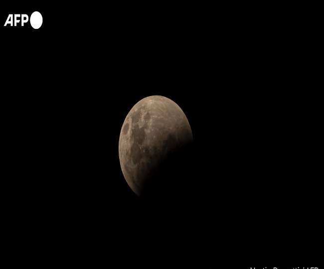 साल के पहले चंद्र ग्रहण का नजारा। (फोटो-एएफपी)